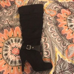 Knee high heeled boots